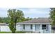 Charming single-story home featuring a freshly painted exterior and a well-maintained front yard at 772 Whippoorwill Dr, Orlando, FL 32825