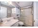 Bathroom showcasing a glass enclosed shower, vanity, and coordinating fixtures and decor at 824 Timor Ave, Orlando, FL 32804