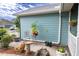 Exterior view highlighting a charming side yard with stone and plants at 8718 Fort Shea Ave, Orlando, FL 32822