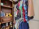 Walk in closet with storage shelves and clothing racks, great for maximizing storage at 9034 Paolos Place Paolos Place, Kissimmee, FL 34747