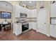 Well-equipped kitchen with stainless steel appliances, granite countertops, and ample cabinet space at 9034 Paolos Place Paolos Place, Kissimmee, FL 34747