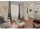 Relaxing living room with tile floors and soothing color palette at 9034 Paolos Place Paolos Place, Kissimmee, FL 34747