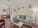 Relaxing living room with tile floors and soothing color palette at 9034 Paolos Place Paolos Place, Kissimmee, FL 34747