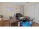 The office features a large desk and neutral paint at 9034 Paolos Place Paolos Place, Kissimmee, FL 34747