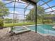 Screened in pool and hot tub overlooking the peaceful lake at 9034 Paolos Place Paolos Place, Kissimmee, FL 34747