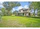 Beautiful two-story home surrounded by lush landscaping and vibrant green lawn at 922 N Pennsylvania Ave, Winter Park, FL 32789