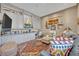 Comfortable living area with built-in storage, decorative accents, and plenty of seating for relaxation and socializing at 922 N Pennsylvania Ave, Winter Park, FL 32789
