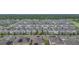 Expansive aerial view of a neighborhood filled with houses at 9941 Introduction Way, Orlando, FL 32832