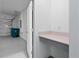 Attached garage with storage space and access door at 9941 Introduction Way, Orlando, FL 32832