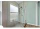 Modern bathroom featuring a large tiled glass shower at 1008 Soldier Creek Ct, Oviedo, FL 32765