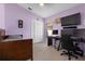 Purple room featuring a bed, desk with monitors, closet, and a natural light window at 1008 Soldier Creek Ct, Oviedo, FL 32765