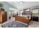 Bright and spacious bedroom with natural lighting and wooden furniture set at 1008 Soldier Creek Ct, Oviedo, FL 32765