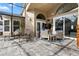 Covered patio area features comfortable seating and view of the pool at 1008 Soldier Creek Ct, Oviedo, FL 32765