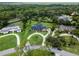 Beautiful property with a circular driveway and well-manicured landscaping in a peaceful, wooded community at 104 Amberwood Ct, Longwood, FL 32779