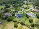 Expansive property with a gorgeous pool and meticulously maintained landscaping in a lush, green community at 104 Amberwood Ct, Longwood, FL 32779