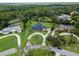 Beautiful property with a circular driveway and well-manicured landscaping in a peaceful, wooded community at 104 Amberwood Ct, Longwood, FL 32779