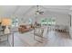 Bright, modern living room with large windows and plenty of natural light at 104 Amberwood Ct, Longwood, FL 32779