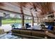 Outdoor patio with screened-in pool and covered seating area perfect for relaxation and enjoying the backyard views at 104 Amberwood Ct, Longwood, FL 32779