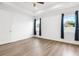 Bright bedroom featuring hard surface flooring and neutral walls, offering a serene retreat at 1091 Wood Dale Cir, Oviedo, FL 32765
