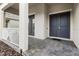 Inviting front porch with stylish railings and a paved entryway leading to a double door entrance at 1091 Wood Dale Cir, Oviedo, FL 32765