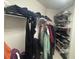 Open walk-in closet is equipped with wire and rod racks at 11236 Rouse Run Cir, Orlando, FL 32817