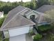 Charming single-Gathering home with a well-maintained lawn and attached two-car garage in a suburban neighborhood at 11236 Rouse Run Cir, Orlando, FL 32817