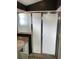 Bathroom stall featuring frosted sliding door and metal trim at 11236 Rouse Run Cir, Orlando, FL 32817