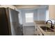 The kitchen features sleek stainless steel appliances and granite countertops at 11588 Westwood Blvd # 1523, Orlando, FL 32821
