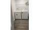 Functional laundry room with modern appliances and ample storage space at 11588 Westwood Blvd # 1523, Orlando, FL 32821