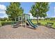 Community playground with slide and climbing features, ideal for Gathering fun at 11616 Thacker Dr, Clermont, FL 34711