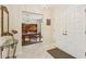 Welcoming foyer with tile flooring, view of dining room, and front door at 1425 Mt Laurel Dr, Winter Springs, FL 32708