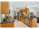 Well-equipped kitchen with granite countertops and stainless steel appliances at 1425 Mt Laurel Dr, Winter Springs, FL 32708
