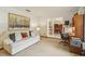 Comfortable living area featuring stylish decor and natural light at 1425 Mt Laurel Dr, Winter Springs, FL 32708
