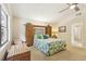 Spacious main bedroom featuring built-in cabinets and a ceiling fan at 1425 Mt Laurel Dr, Winter Springs, FL 32708
