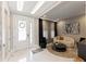 Elegant foyer with decorative door, statement lighting and artful decor at 14744 Spotted Sandpiper Blvd, Winter Garden, FL 34787