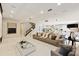 Expansive open-concept living and kitchen area with modern design elements and upscale decor at 14744 Spotted Sandpiper Blvd, Winter Garden, FL 34787