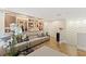 Stylish living room with custom shelving, sleek furniture, and a modern design at 14744 Spotted Sandpiper Blvd, Winter Garden, FL 34787