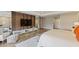 A contemporary style main bedroom boasts a sleek design and natural light at 14744 Spotted Sandpiper Blvd, Winter Garden, FL 34787
