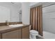 Bathroom featuring a vanity with sink, toilet, and shower with curtain at 15038 Willow Ln, Tavares, FL 32778