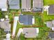 Aerial view of property showing roof, backyard, driveway, and surrounding neighborhood with red boundary lines at 1706 Terra Cota Ct, Orlando, FL 32825