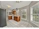 Bright and spacious kitchen featuring lots of natural light and tile flooring at 1706 Terra Cota Ct, Orlando, FL 32825