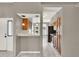 Open view of kitchen with tile countertops and vintage wood cabinetry at 1706 Terra Cota Ct, Orlando, FL 32825