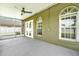 Covered patio with fan, overlooking backyard at 1706 Terra Cota Ct, Orlando, FL 32825