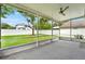 The large screened-in patio offers great views of the backyard at 1706 Terra Cota Ct, Orlando, FL 32825