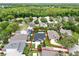 Aerial view of a property outlined in red, featuring a well-manicured lawn and a residential home at 1706 Terra Cota Ct, Orlando, FL 32825