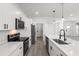 Stylish kitchen boasting stainless steel appliances, quartz countertops, and modern hardware at 17465 Sw 41St Cir, Ocala, FL 34473