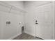 Mud room with storage shelf and exterior access door at 17465 Sw 41St Cir, Ocala, FL 34473