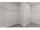 Walk-in closet features ample shelving for organization at 17465 Sw 41St Cir, Ocala, FL 34473