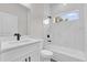 Bathroom featuring quartz countertops, modern fixtures, and a bath and shower combination at 17501 Sw 41St Cir, Ocala, FL 34473