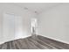 Bedroom with a closet, gray flooring and access to other parts of the home at 17501 Sw 41St Cir, Ocala, FL 34473